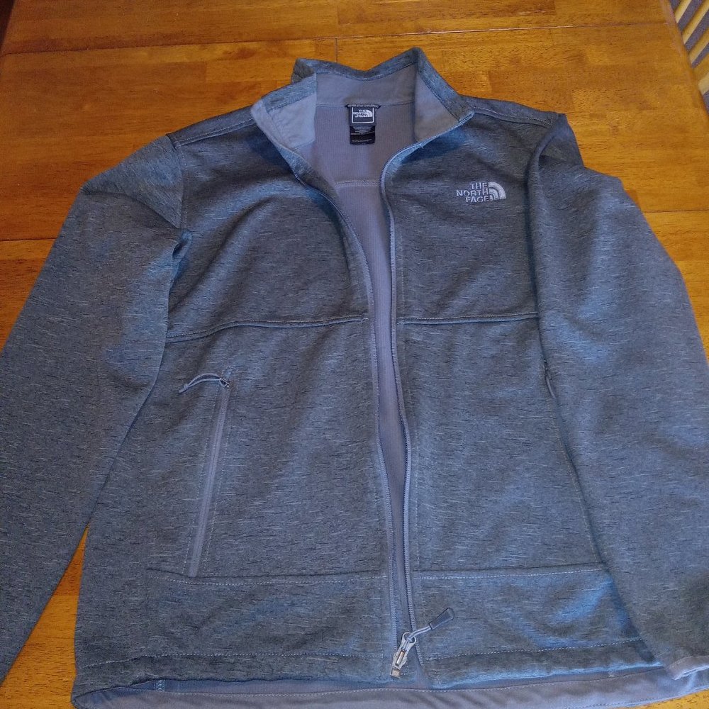 The north face.  Mens size medium full zip sweater jacket  great condtion